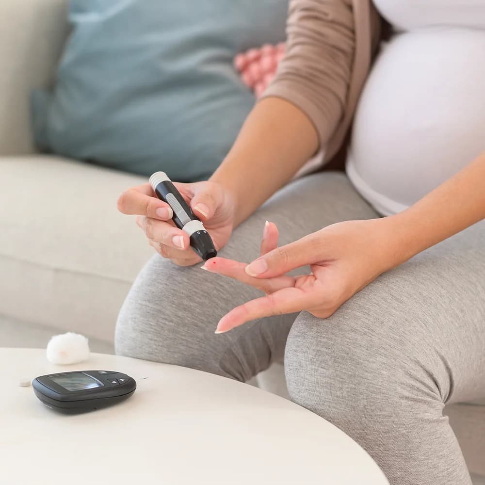 Women Doing her own Diabetes Test at Home