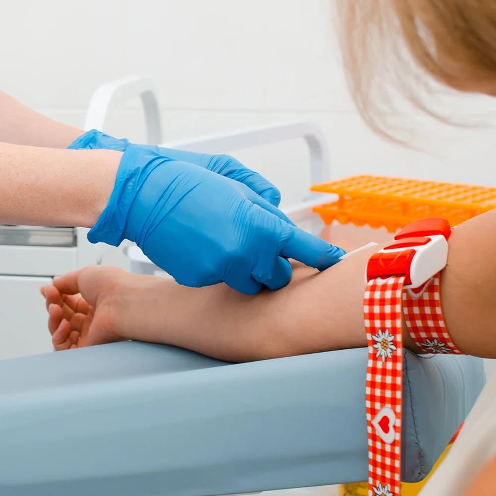 Consultant taking a blood test sample