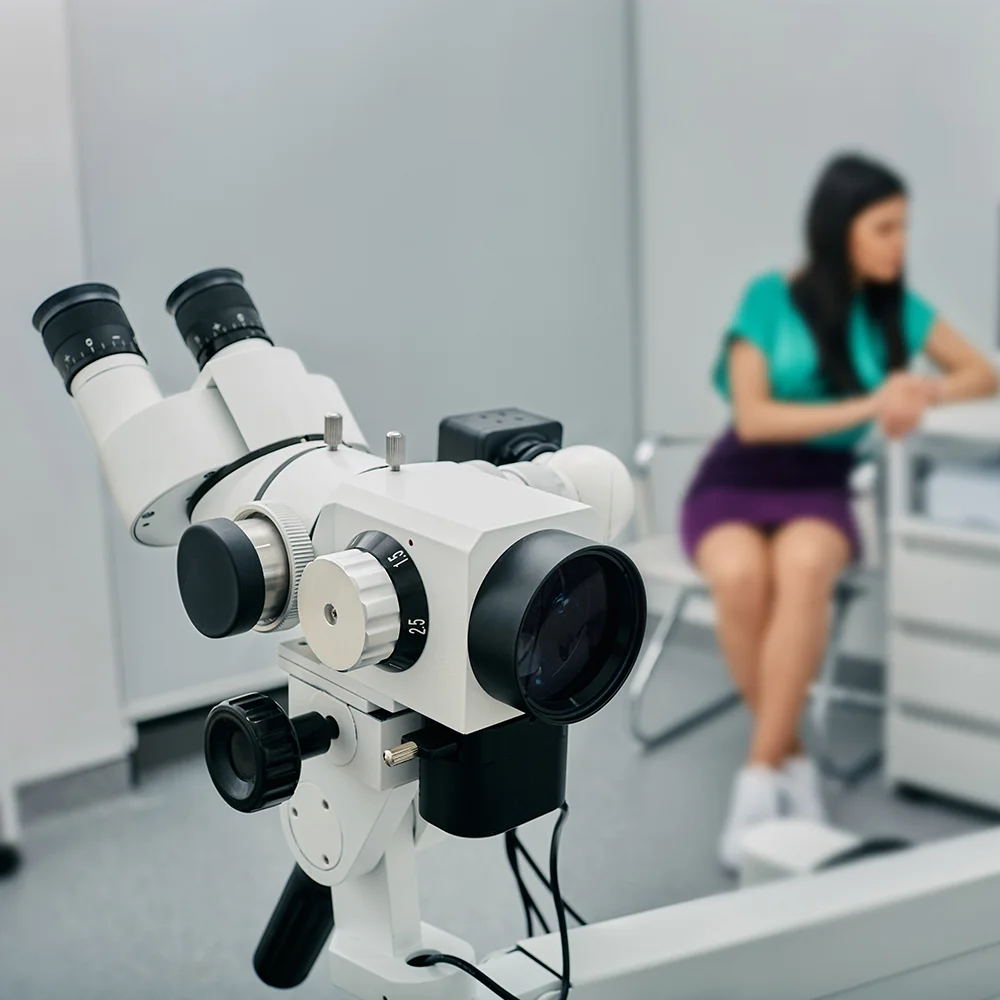 Colposcope equipment in a clinic room