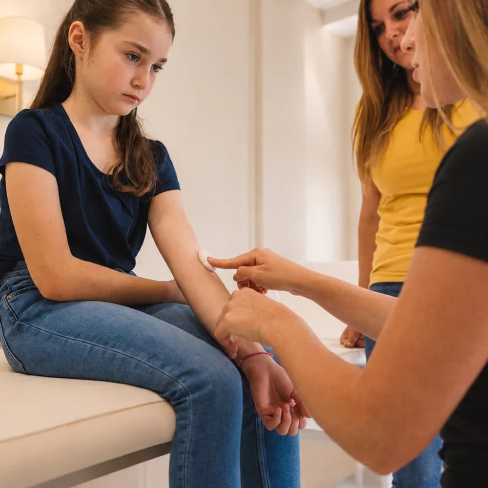 Parent and child speaking with a consultant