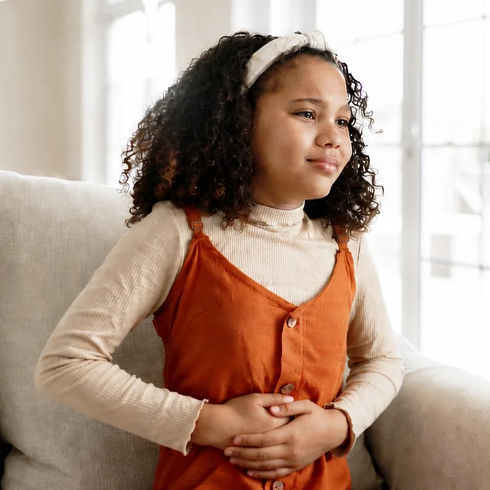Teenager experiencing period pain