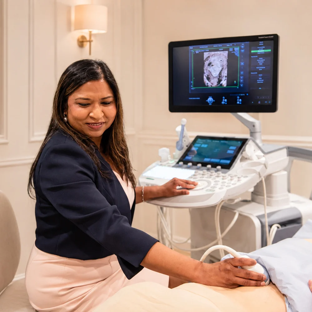 Dr Luxmi Velauthar performing an ultrasound scan