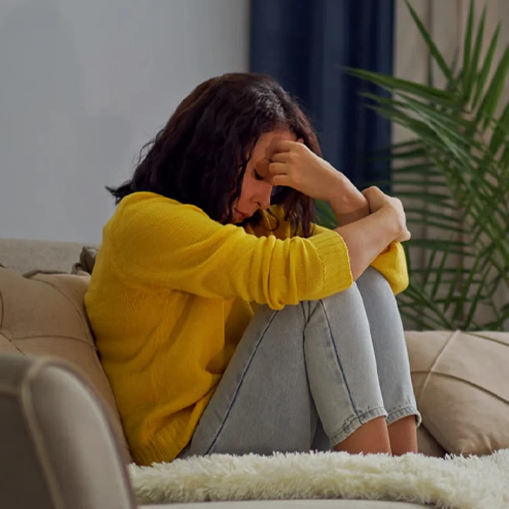 Woman affected by hot flushes and sleep disturbance